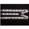 Zebra Music suspenders with piano theme, box